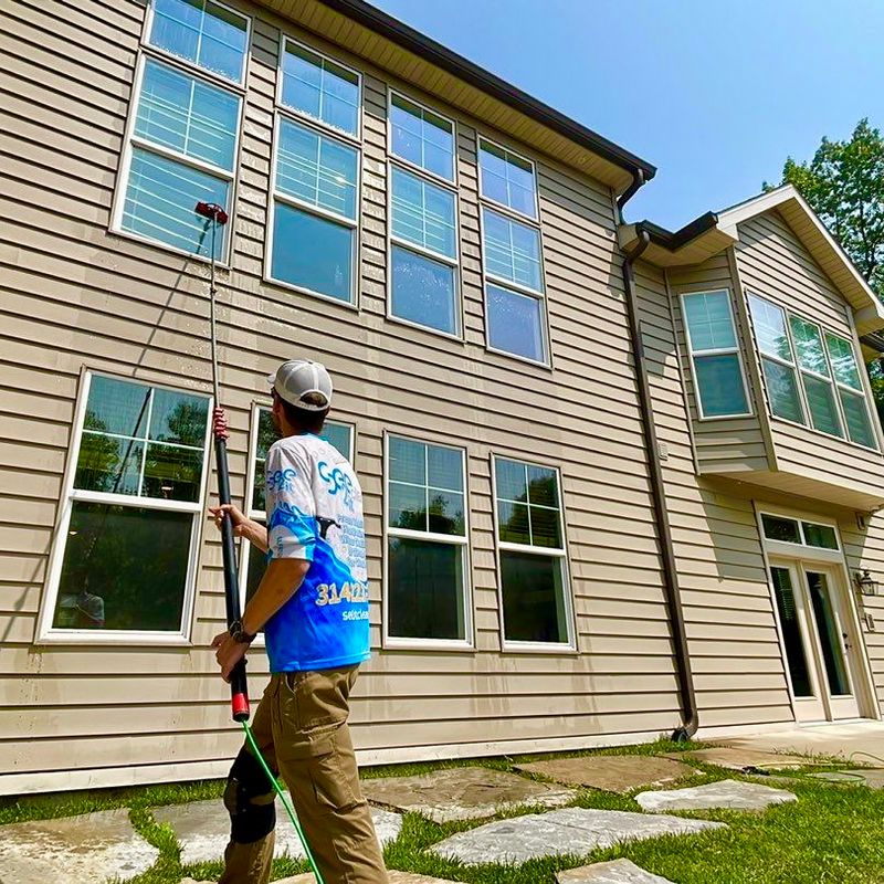 Crystal Clear Views: Comprehensive Window Cleaning and Gutter Protection in Oakville, Mo