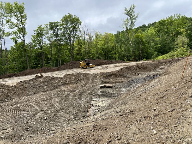 Carving a Pond into a Mountain Side