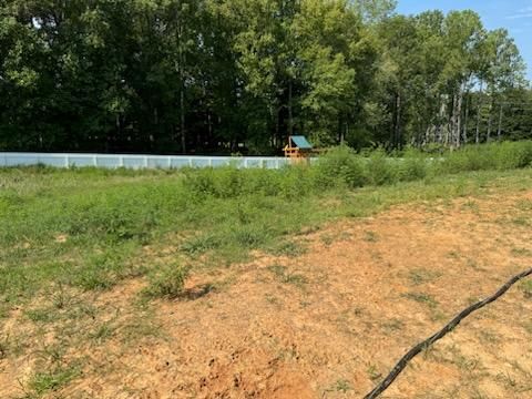 Revitalizing Henley Ridge: Transforming a Family's Backyard for Fun and Safety