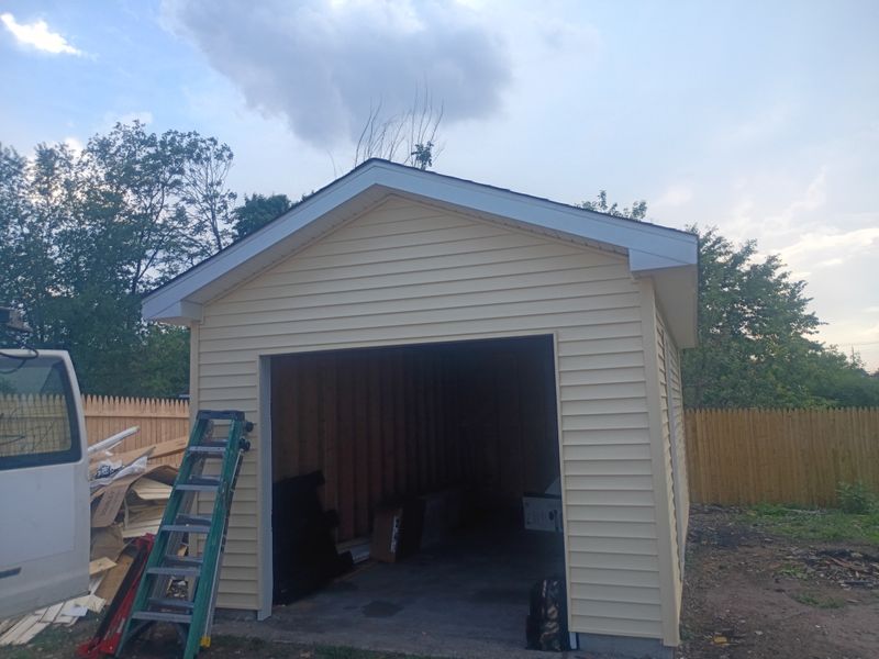 Rebuilding Hope: Exceptional Garage Reconstruction by Buildsmore Contracting Inc.