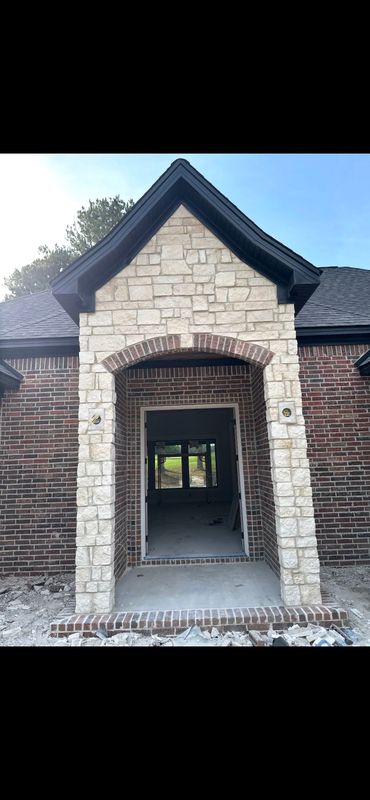 Elegant Entryway Transformation with Masterful Masonry by Stone Works