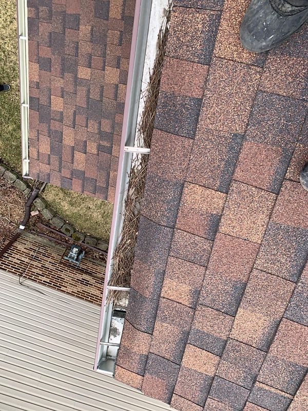 "Expert Gutter Cleaning for a Pristine Two-Story Home: Efficient, Reliable, and On-Time!"