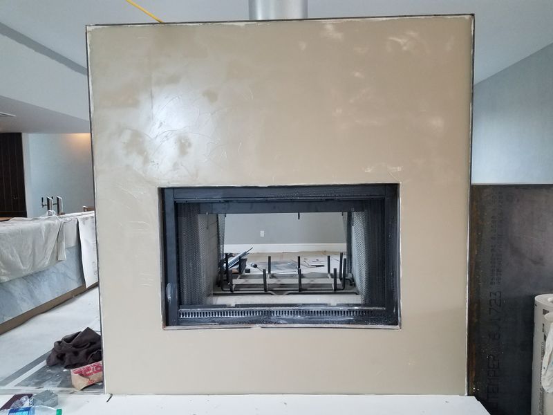 Mirror-Glazed Elegance: Venetian Plaster Mastery in Free Union's Crown Fireplace Transformation