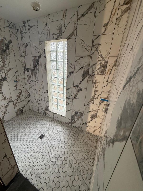 Converting 2 Bathrooms into 1