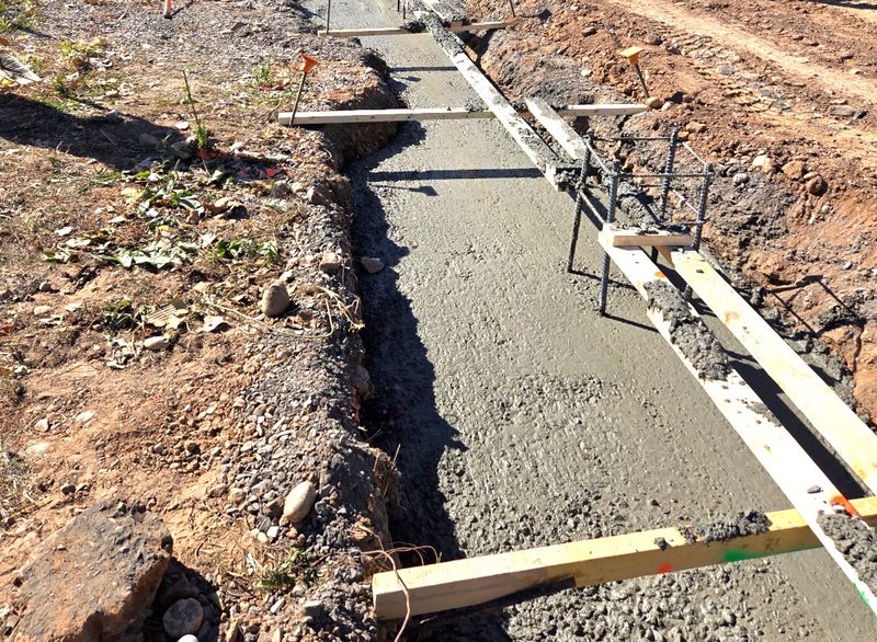Structural Block, Concrete Footers, Curb