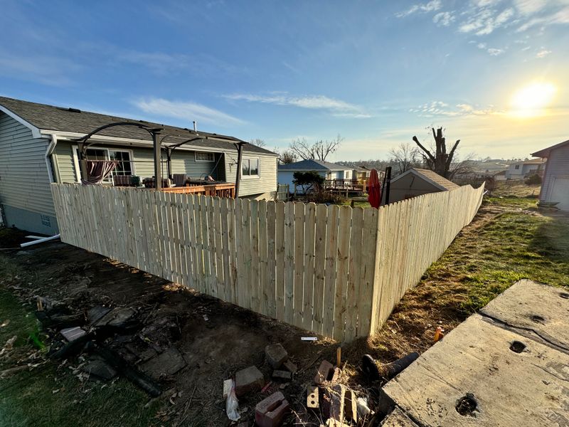 Storm-Damaged Backyard Fence Torn Down and Rebuilt From Scratch