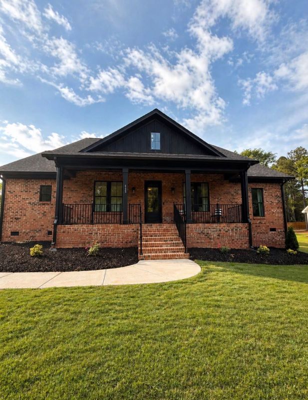 Revitalized Home Facade: Expert Pressure Washing by Honey Exterior Services