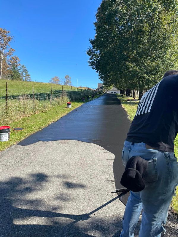 Driveway and Sidewalk Cleaning & Sealing