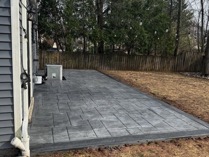 A Clean & Timeless Stamped Concrete Patio