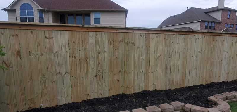 Super Affordable Custom Cedar Side-by-Side Privacy Fence with Cap and Trim Keller Texas