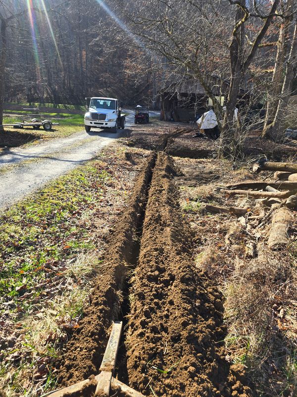 Water line and underground electrical installation