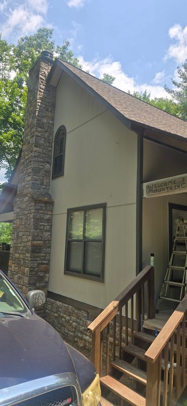 Fort Mountain replaced siding and painted the housw