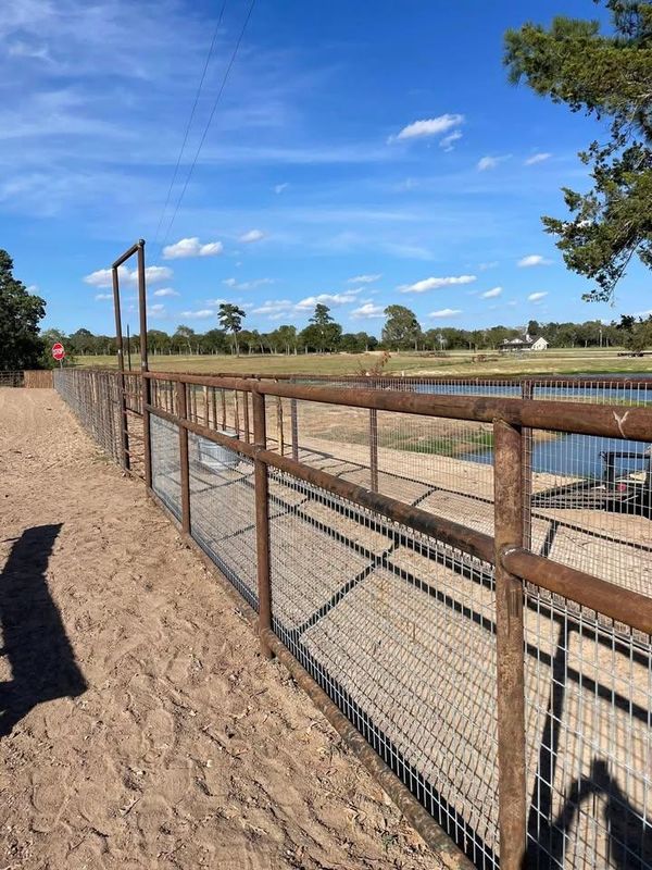 Custom Pipe fencing, entrances and riding arena