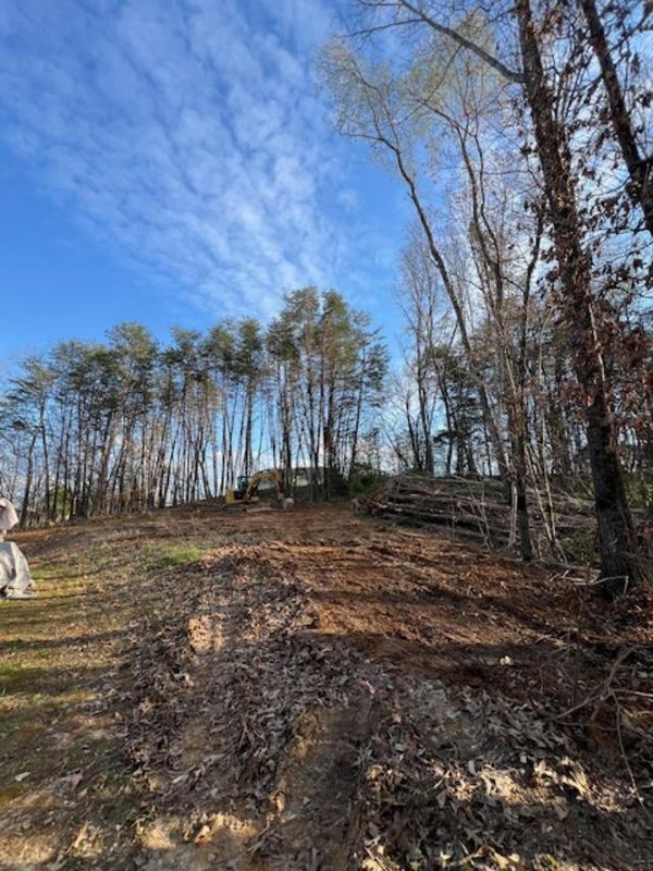 Transforming Terrain: Grayson Groundworks Elevates a home off of Virginia Ave in Sevierville TN with land clearing!