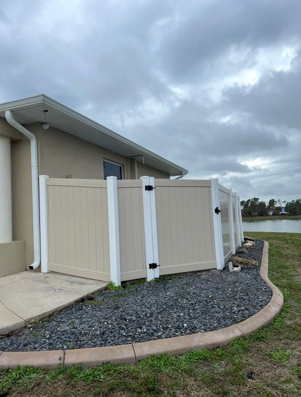 Custom Two-Tone Vinyl Privacy Fencing & Side Gate Enclosure in Port Charlotte, FL