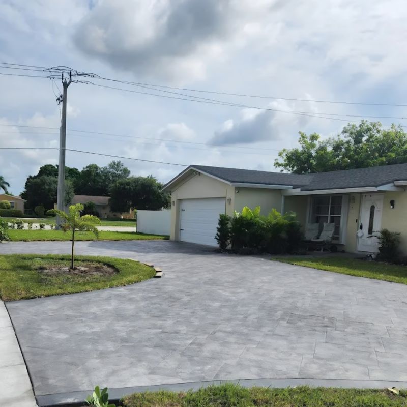 Elegant and Cost-Effective Stamped Concrete Driveway Transformation