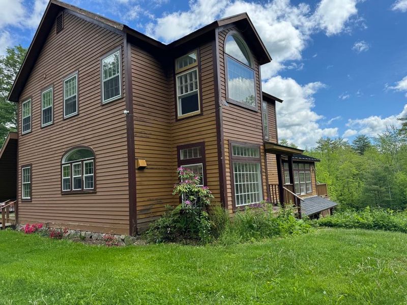 Face lift for this beautiful home. New windows, siding and deck.