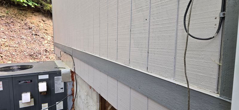 Fort Mountain replaced siding and painted the housw