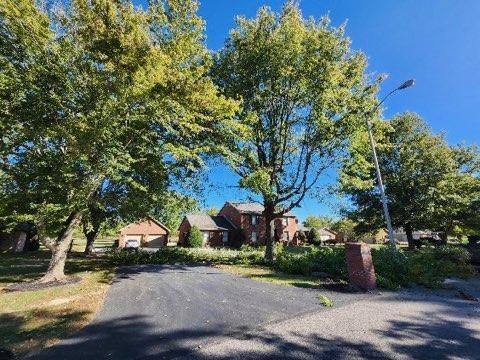 Madisonville Makeover: Expert Tree Removal at Country Club by Curtis Tree Service LLC