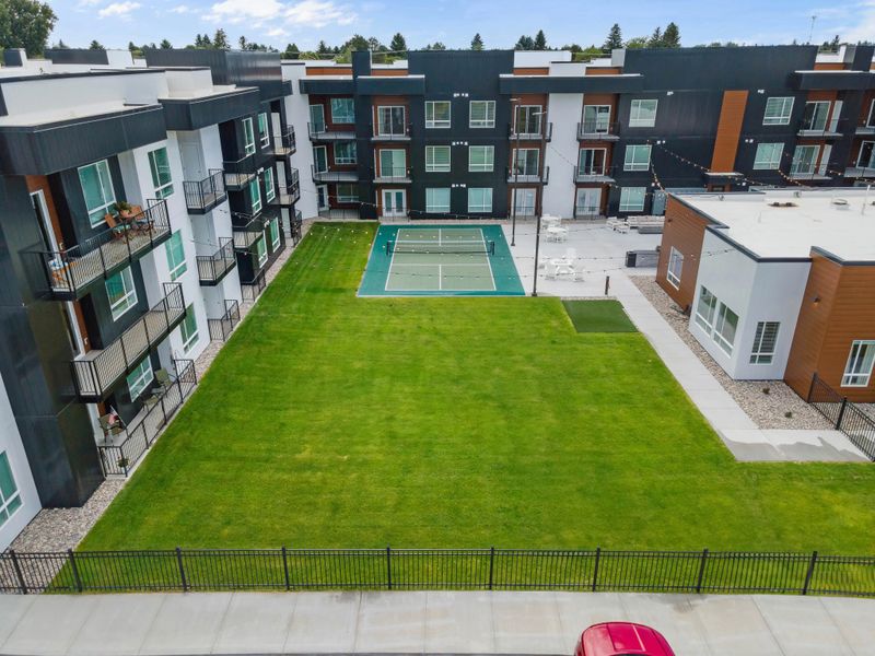 "Modern Urban Living: Legacy Custom Builders' Stunning Multi-Unit Development"
