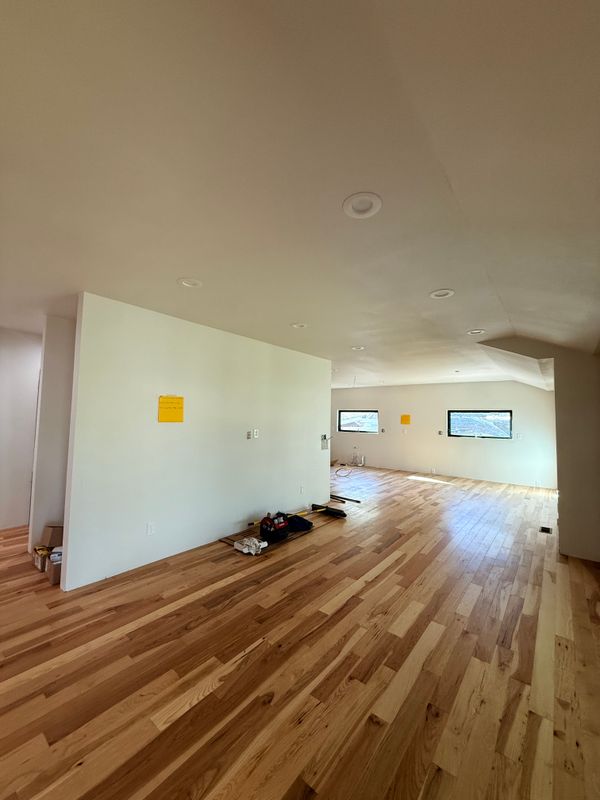 Stunning Hardwood Transformation: Excellence in Craftsmanship by Alpha Flooring & Painting Services