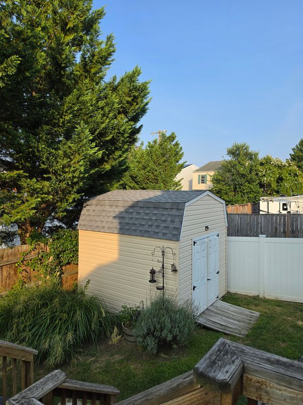 Storm-Damaged Shed Roof & Siding Restoration