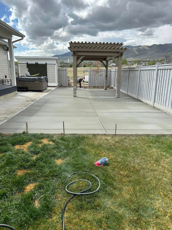 Transforming Outdoor Spaces: A Concrete Patio Enhancement by Hifo Construction