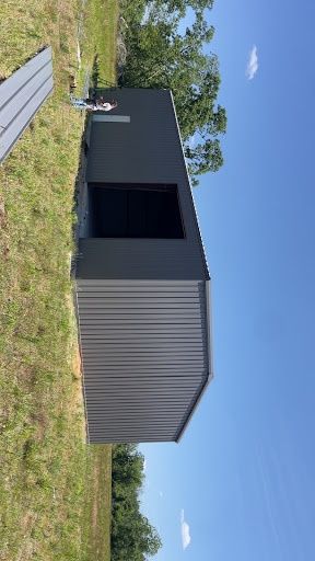 Commercial, Residential & Agricultural Red-Iron Buildings