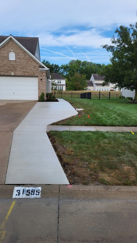 Transforming Driveways: Concrete Pros' Stunning Makeover
