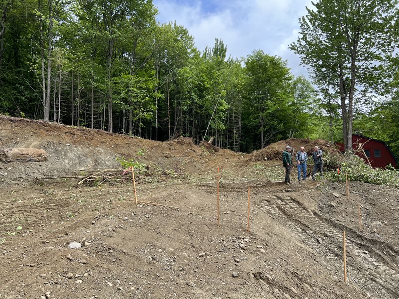 Carving a Pond into a Mountain Side