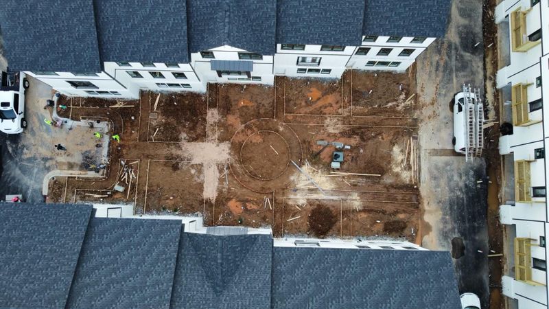 Transforming Spaces: Canales Construction's Concrete Excellence in Urban Courtyard Design