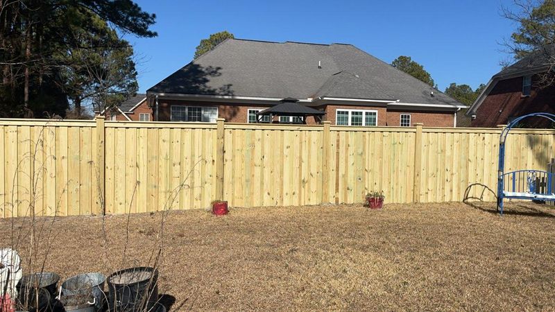 "Reviving Elegance: A Charleston Style Privacy Fence Masterpiece in Columbia’s Wildwood Subdivision"