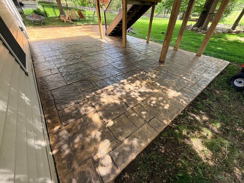 Elevate Your Outdoor Living: Stunning Stamped Concrete Patio Sealer by CalRod Construction LLC