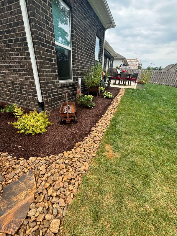 Transformative Front Yard Makeover: Elegant Stone Pathways and Lush Greenery by UPscape