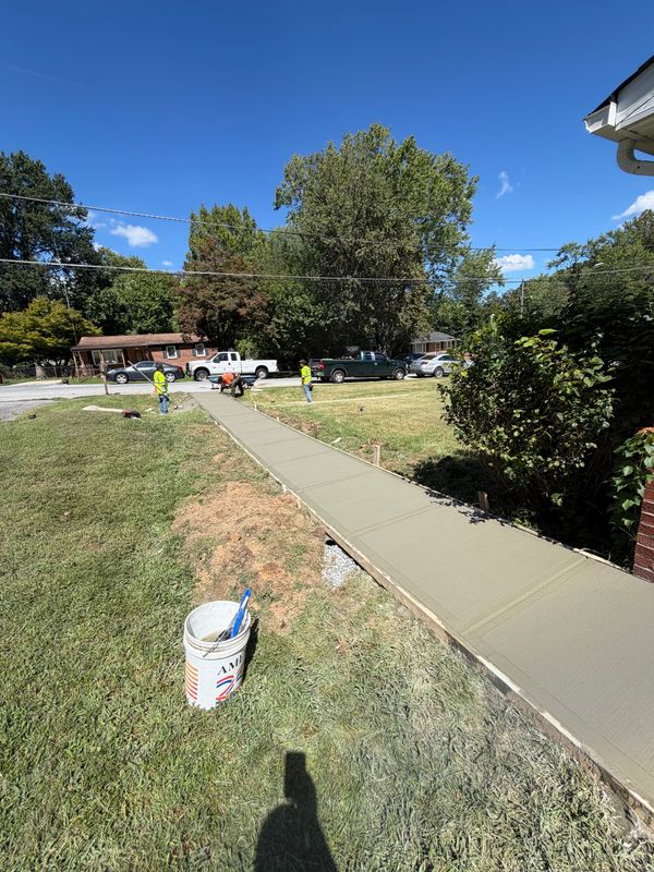 Concrete Sidewalk with Culvert Pipe installation