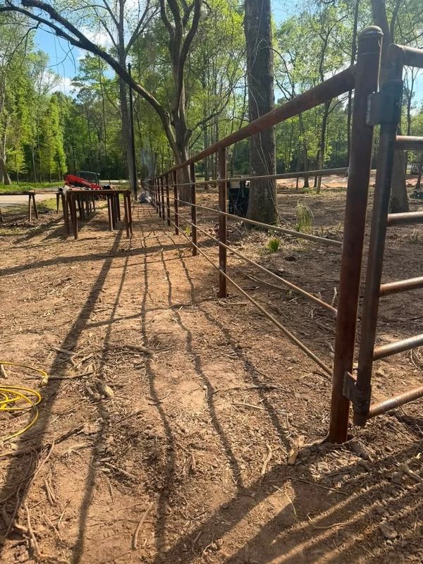 Custom Pipe fencing, entrances and riding arena