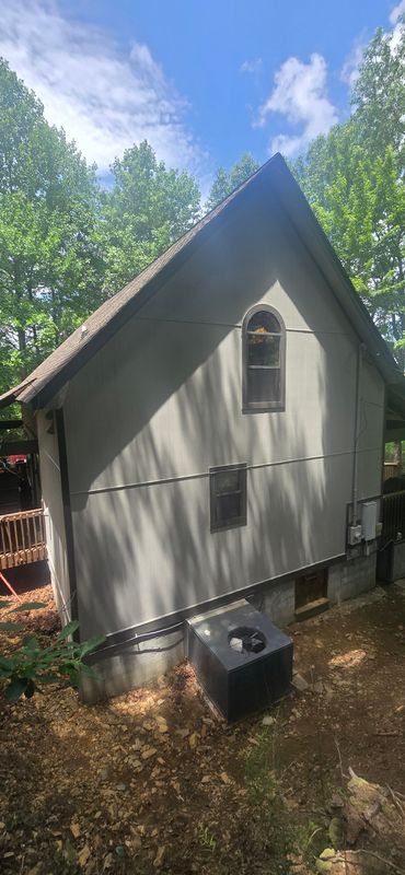 Fort Mountain replaced siding and painted the housw