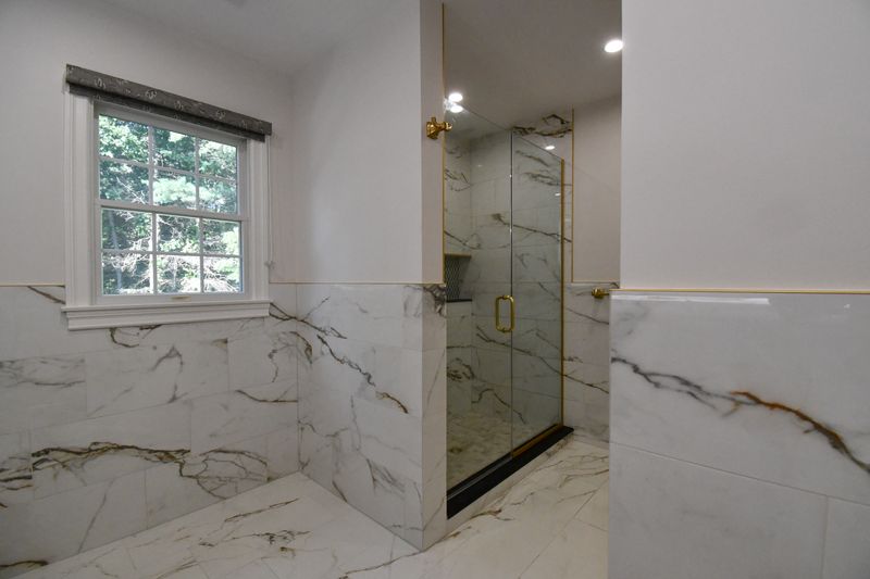Luxurious Marble Bathroom Oasis by Top Pros Construction