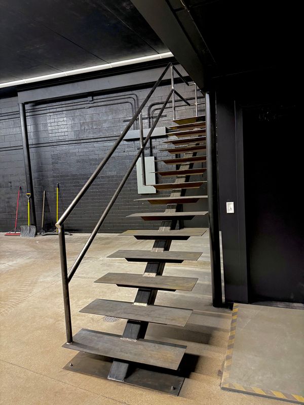 Custom Mono Stringer Staircase Built for BCBA HQ in Eden Prairie