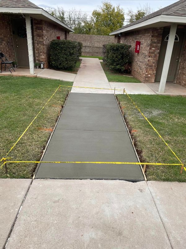 Commercial ADA Ramps, Sidewalk, Parking Bollards w/Signage, Curb/Gutter, Parking Lot Repair