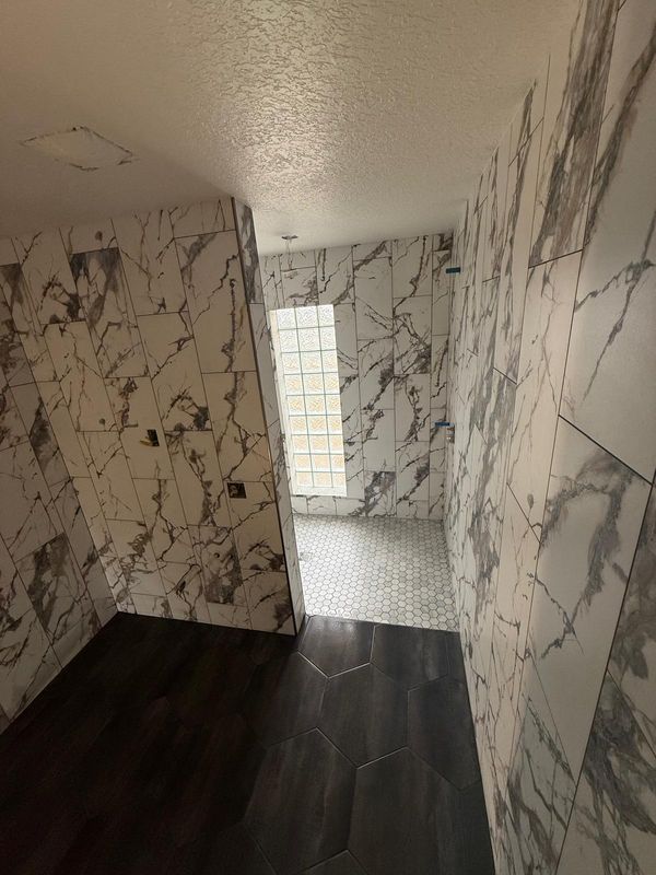 Converting 2 Bathrooms into 1