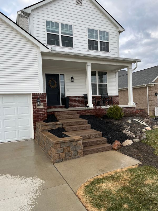 Restoring Elegance: Expert Porch Steps and Retaining Wall Revitalization by Sunstone Construction
