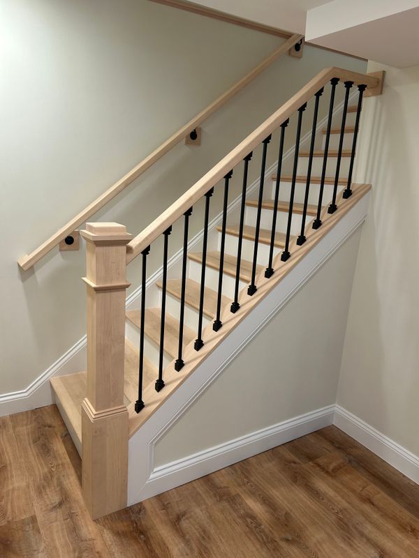 "Crafting Elegance in Glendale: Blair Construction’s Custom Bar and Stair Transformation"