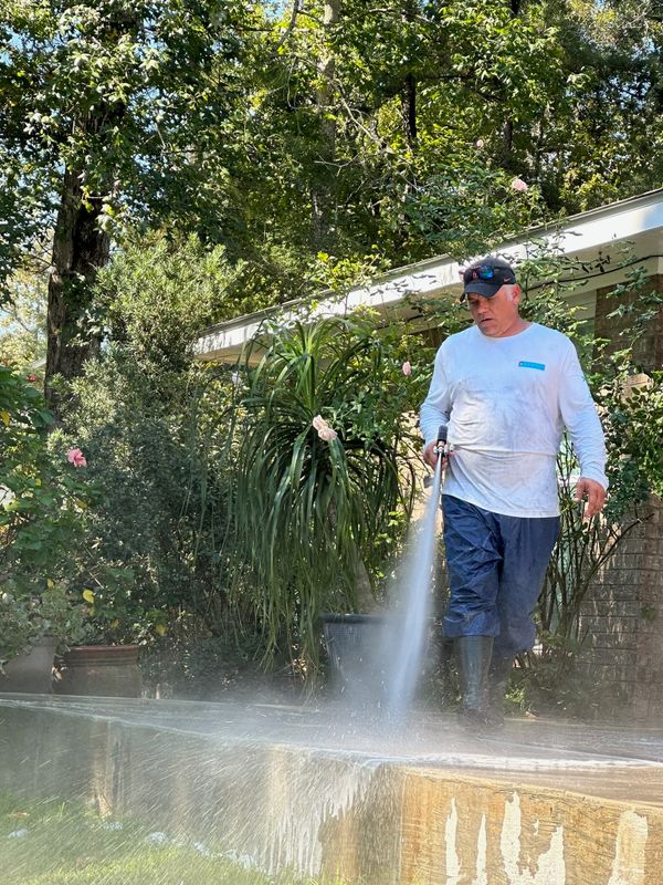 Pressure washing and soft washing