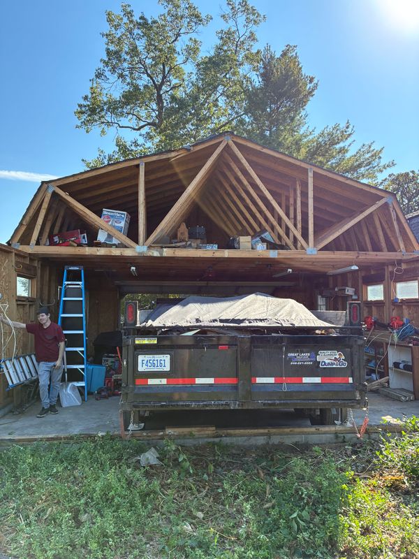 Clear Cut Demo & Construction dumpster trailer delivered to a home in Farmington Hills, Michigan