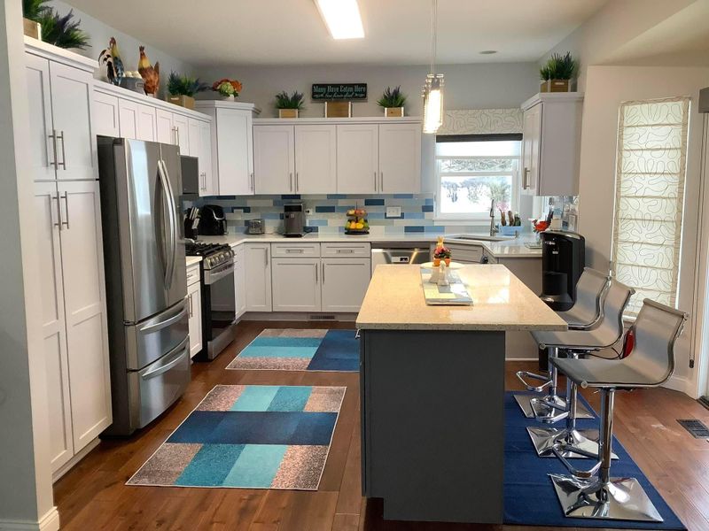 Revitalize Your Kitchen: Aurora's Premier Cabinet Painting and Refacing Transformation by TL Painting