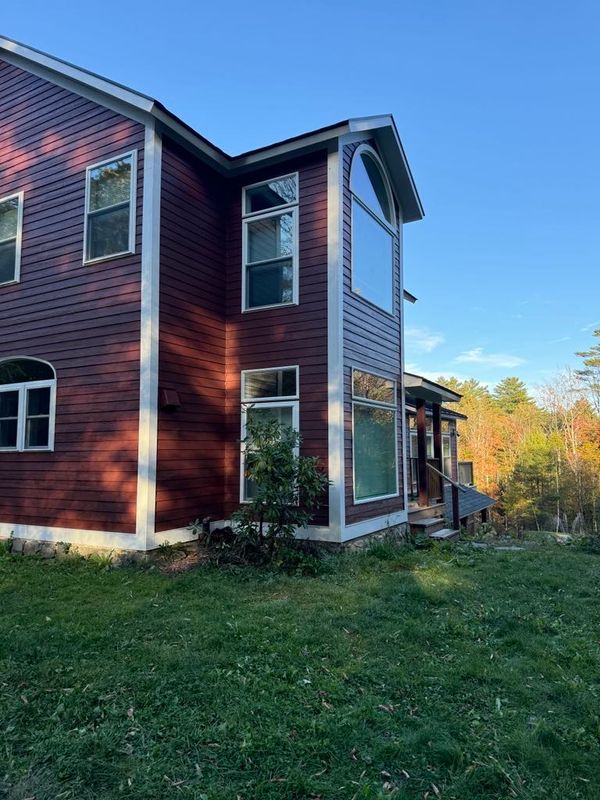 Face lift for this beautiful home. New windows, siding and deck.