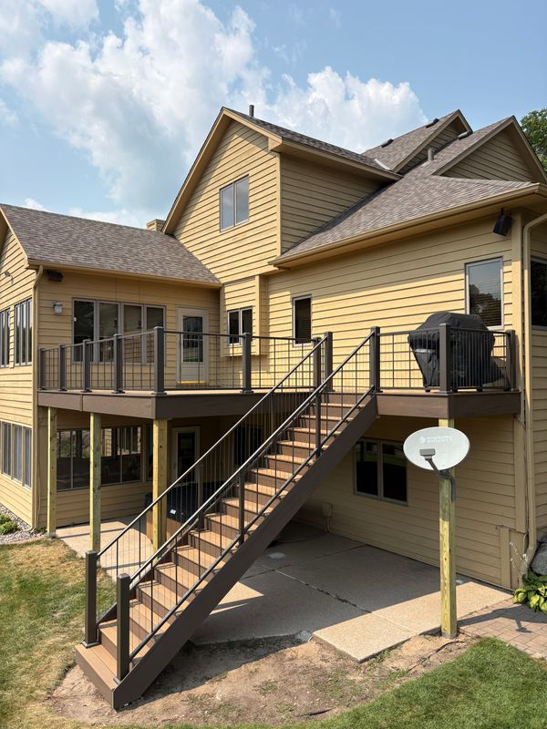 Elevated Elegance: Masterful Deck Transformation with TimberTech and Vertical Cable Design