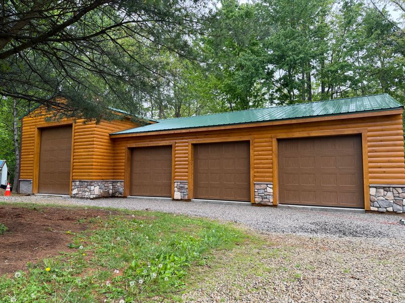 Four Custom Garage Doors Installed on a New Barn Build