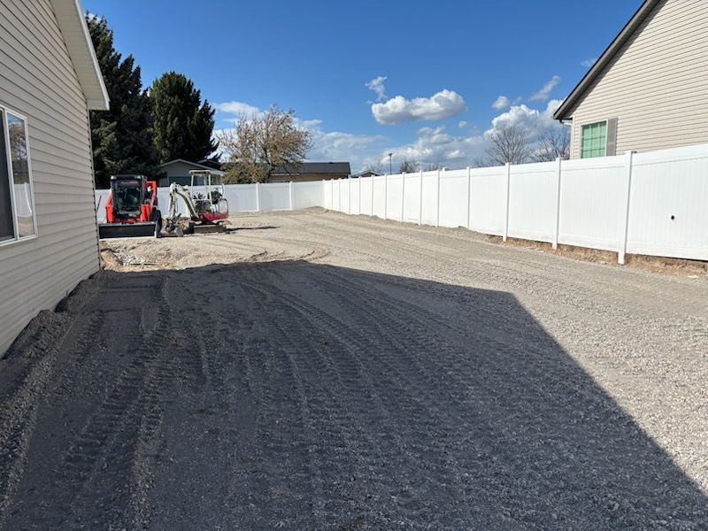 Ammon Oasis: Transformative Landscaping with a 40x100 RV Pad by Falls Property Services